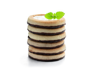 Stack of cream and coconut filling biscuits isolated on white
