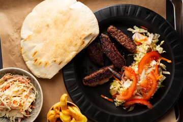 All ingredient ready for pita and salad street food top view meat roasted