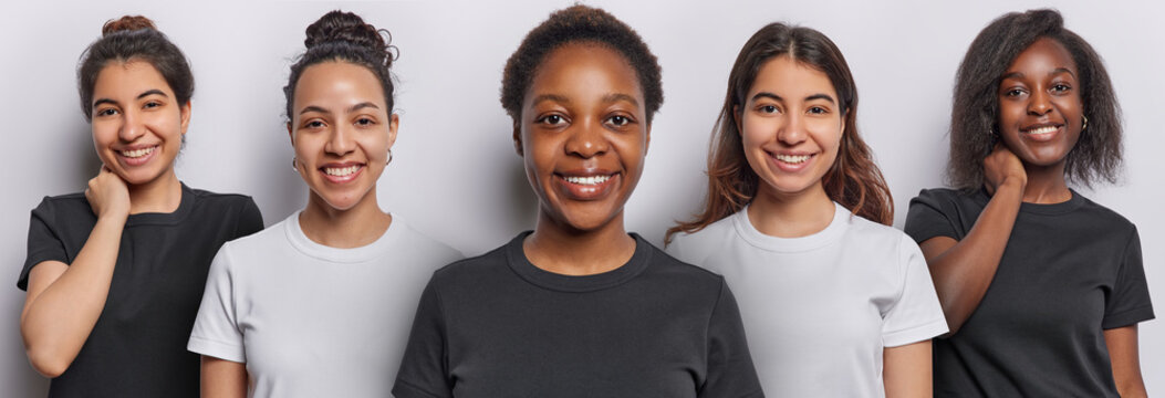 Five diverse young women smile gladfully show perfect teeth express happiness look directly at camera wear casual t shirts glad to hear good news isolated over white background. Collage image