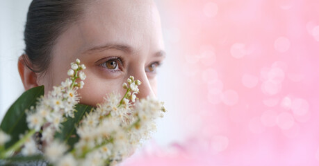 close up part woman's face in flowers, beautiful girl 30 years old, human brown eyes looking to...