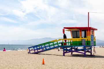 Fototapeta na wymiar Venice Pride flag lifeguard tower, California, USA
