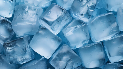 Frozen cubes for beverages - close up of ice cubes on blue background