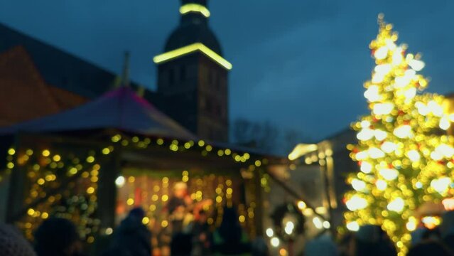 City main square lights up for a festive Christmas concert at night