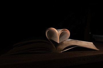 Book pages forming a very romantic heart