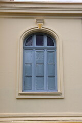 light gray vintage window pane on beige wall