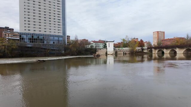 Roman bridge crossing the Pisuerga River in the monumental city of Valladolid, Spain.