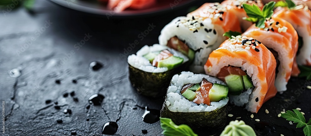 Aufkleber sushi rolls close up with salmon avocado and cucumber. creative banner. copyspace image