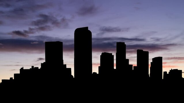 Colorado: View of Denver Skyline at Twilight, Time Lapse with Colourful Clouds and Dark Silhouette of Skyscrapers