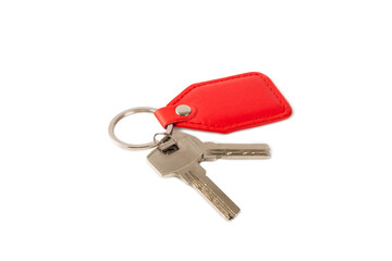 Leather keychain with key ring isolated on white background. Concepts for real estate and moving home or renting property. Buying a property. Mock-up keychain.Copy space.