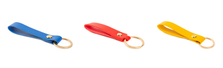 Leather keychain with key ring isolated on white background. Concepts for real estate and moving home or renting property. Buying a property. Mock-up keychain.Copy space.