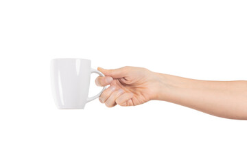 A woman's hand holds a white ceramic cup isolated on transparent png background with clipping paths. Tea or coffee break.