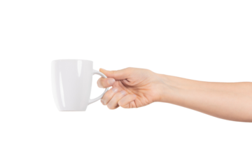 A woman's hand holds a white ceramic cup isolated on transparent png background with clipping paths. Tea or coffee break.