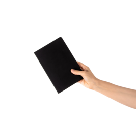 Woman hand showing black notebook, holding textbook or organizer, education, reading literature. Indoor studio shot isolated on transparent png background with clipping paths. 