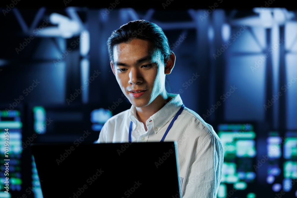 Poster asian man between server hub rows providing processing resources for businesses worldwide. system ad