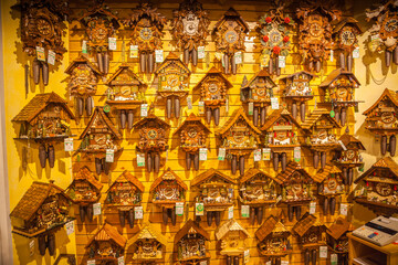 Vintage wooden cuckoo clocks on a wall, Triberg, Germany