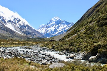 Fototapeta na wymiar New zealand Mountains with snow and river in front