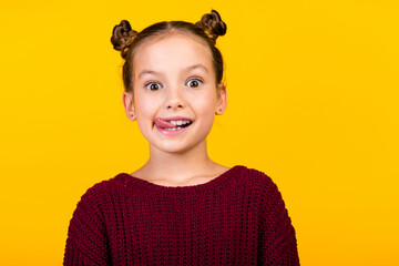 Portrait of excited positive girl have good mood tongue lick teeth lips empty space isolated on...