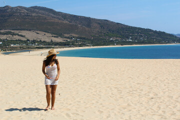 Fototapeta na wymiar latin girl on the Tarifa beach in summer