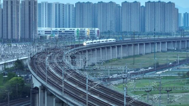 high speed train running on elevated railtrack