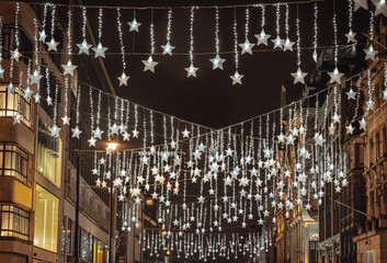 Christmas stars decoration led lights display. Dramatic view of the traditional Christmas...