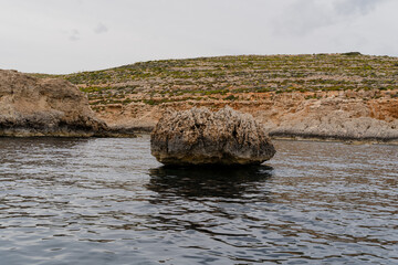 Rocky coast of Malta. Cliff view.