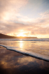 Fototapeta premium Sunset at beach - west coast