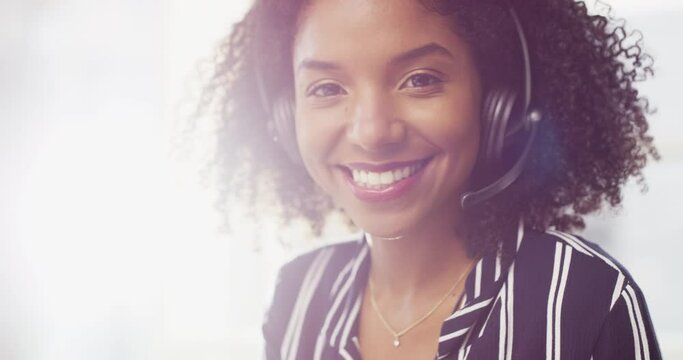 Phone call, black woman in callcenter and contact us for communication, CRM and customer service consultant. Help desk, headset with microphone and portrait, agent in telemarketing sales with telecom