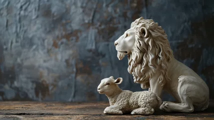 Poster Lion and lamb sculpture on a rustic wooden background © Artyom