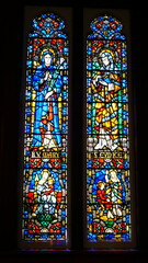  shot of the beautiful window art in a religious Christian or catholic chapel 
