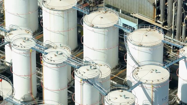 A diesel and biodiesel refinery employs various chemical and mechanical processes to convert feedstock into diesel fuel and biodiesel, adhering to industry standards and environmental regulations.