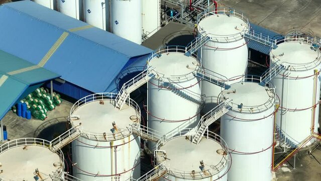 A precision-engineered Diesel and Biodiesel Refinery employs advanced processes to transform feedstocks into high-quality diesel and biodiesel products. Oil and energy concept. Drone view.
