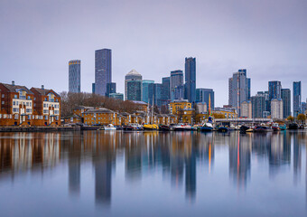 Fototapeta na wymiar View of skyscrapers in London city as seen from Surrey docks, England