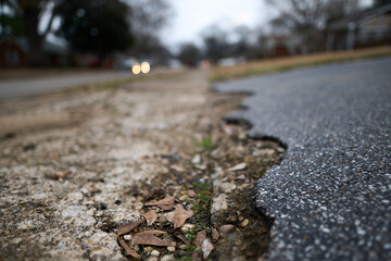 Very Harsh Road Conditions and Sidewalk with Massive Cracks and Damage