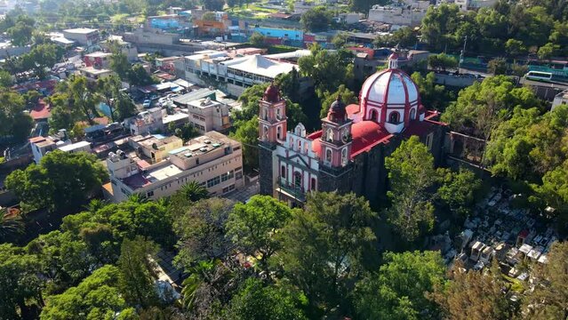 Aerial orbit of Iztapalapa Cathedral, Señor de la Cuevita in CDMX, Mexico - atrium full of greenery