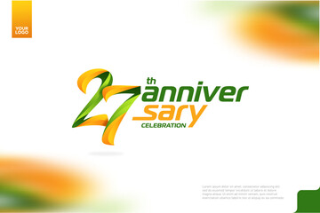 27th Anniversary logotype with a combination of orange and green on a white background.