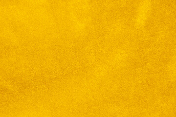 light yellow velvet fabric texture used as background. silk color gold fabric background of soft and smooth textile material. crushed velvet .luxury golden light tone for silk.