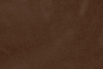 Brown color velvet fabric texture used as background. Empty brown fabric background of soft and smooth textile material. There is space for text.