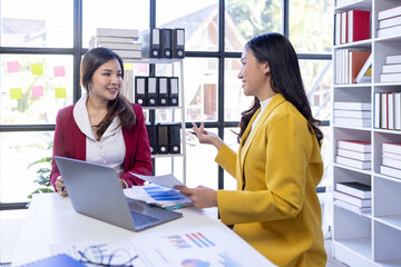 Teamwork meeting, laptop and business people in office workplace. Collaboration, technology and workers, women or employees with touchscreen planning sales, research or financial strategy in company