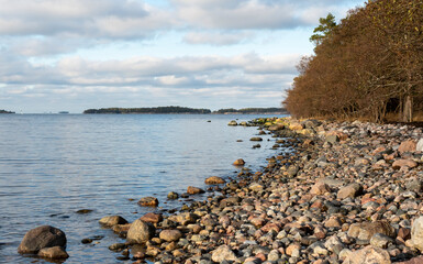 Rocky beach in the archipelago in Finland on a bright autumn day