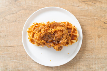fried chicken waffle with honey or maple syrup