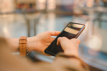 Social media marketing concept. Women hand using smartphone typing, chatting conversation.