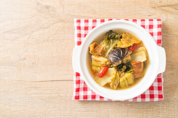 boiled pickled cabbage and bitter gourd soup