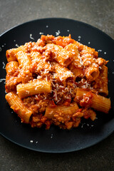 Rigatoni pasta bolognese with cheese