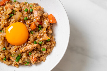 salmon fried rice with pickled egg on top