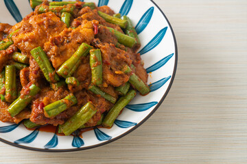 Stir fried pork with red curry paste