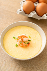 Steamed egg with shrimp and spring onions