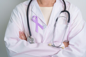 Doctor with purple ribbon for world cancer day, lupus, Pancreatic, Esophageal, Testicular cancer,...