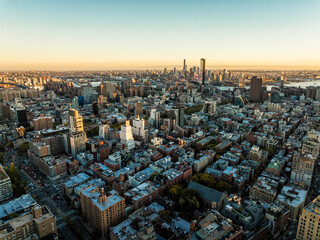 Aerial view of Manhattan buildings, New York City at sunset, wide angle view towards Brooklyn	