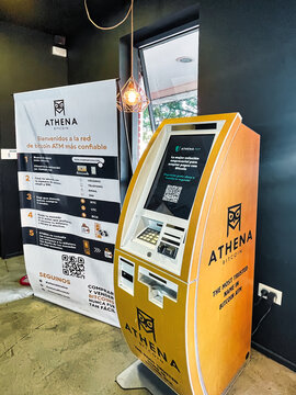 buenos aires, argentina - 29 October 2022 : crytocoin bitcoin exchange point and sign on desk
