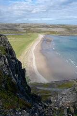 High angle view to a sandy beach along the Norwegian Scenic Route Varanger, Båtsfjord, Norway